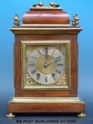 A 19thC or early 20thC mahogany and brass bracket clock, the dial with engine turned centre,