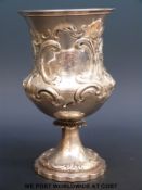 A Victorian hallmarked silver goblet with embossed decoration, height 17cm, London 1851,
