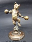 A 19thC bronze performing bear with ball ended pole,