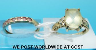 A 9ct gold ring set with pink stones and a 9ct gold ring set with zircon