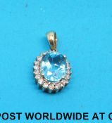 A 14ct diamond and aquamarine pendant
