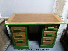 An oak pedestal desk (width 113cm, depth 60cm,