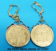 A pair of 9ct gold earrings each set with an 1982 shield back gold half sovereign (10.
