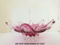 A large Murano glass bowl with pierced and reeded decoration of pink colouration, 16cm tall,