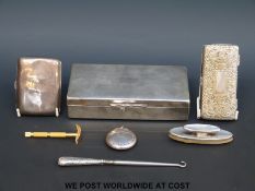 An Asprey locket compact with mirror to interior of lid, Birmingham 1917,