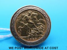 A 9ct gold ring set with a 1929 gold full sovereign (15.
