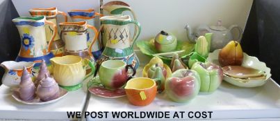 A large collection of Myott jugs and a selection of Carltonware cruet sets, jug and small bowl,