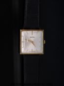 Roamer 14ct gold gentleman's wristwatch with gold hands and baton markers on stainless steel face,