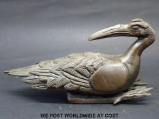 A bronze seated vulture probably Chinese length 14cm