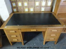 A seven-drawer desk (width 152cm, depth 90cm,
