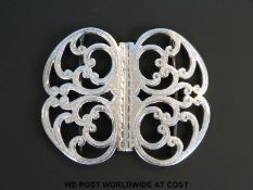 A George V hallmarked silver nurse's belt buckle, Sheffield 1911, width 6.