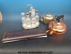 A six bottle cut glass cruet on silver plated stand, plated teapot,