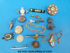 A collection of brooches including yellow metal micro mosaic brooch, jadeite brooch,