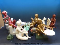 A collection of approximately 15 Art Deco style ceramic and other figurines