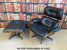 An Eames style armchair and footstool
