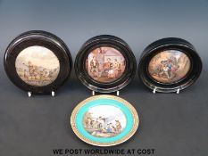Three Prattware pot lids in frames and a plate