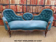 A Victorian conversation settee,