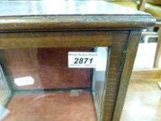 A glazed wall hanging display cabinet (width 32cm, depth 23cm,