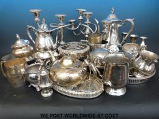 A large quantity of silver plate to include candelabra, teaware,