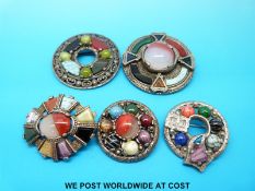 Four Miracle brooches in Scottish style