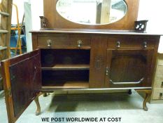 A Late 19th/early 20thC sideboard with beaded oval mirror back (width 137cm, depth 48cm,