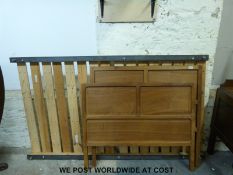 A Fred Gardiner Cotswold School walnut Arts & Crafts bed of paralleled design,