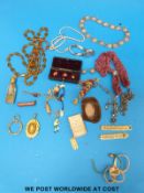 A collection of jewellery to include a white metal necklace, a cut steel miser purse,