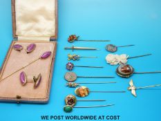 Twelve stick pins including a white metal Masonic example,