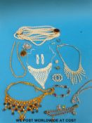 A collection of costume jewellery to include necklaces, watches, silver bracelet,