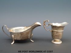 A Viners Ltd hallmarked silver sauce boat together with a hallmarked silver jug (164g)