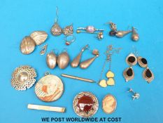 A Scottish silver brooch, silver rings, silver earrings,