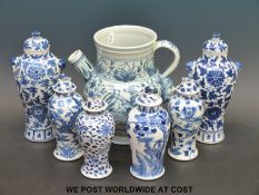 A collection of Chinese blue and white vases and covers and a French jug.