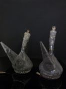 A pair of Spanish cut glass silver-mounted Porron wine pourers,