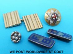 A Cartier London ribbed yellow metal cufflink marked 9ct (5.