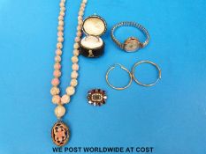 A 9ct gold wedding band, 9ct gold earrings, 9ct gold cased ladies wristwatch,