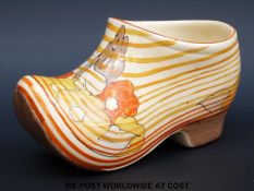 A Clarice Cliff clog decorated with a variation of Fir Trees pattern, with Clarice Cliff,