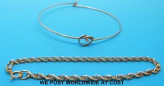 A 9ct gold bangle set with a diamond and a 9ct tope twist bracelet (5.