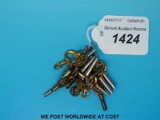 Fourteen various sized pocket watch keys
