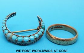 A 22ct gold wedding band (7g) and a Victorian crescent shaped brooch set with turquoise