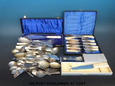 A collection of silver plate, some cased to include fish servers, silver tea spoon,