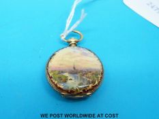 An 18ct gold fob watch case decorated in enamel depicting a river scene (13g)