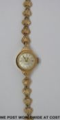 Rotary 9ct gold ladies wristwatch on 9ct gold bracelet (11.