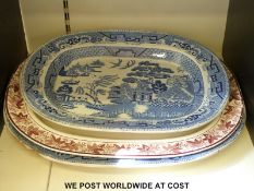 Three large 19thC / 20thC transfer printed meat plates including blue and white willow pattern