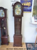 A late 20thC long cased grandmother clock, with German chiming movement and moonphase features,