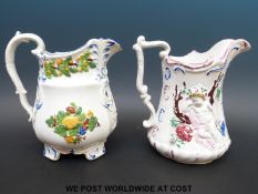 A pair of relief moulded 19thC Prattware jugs,