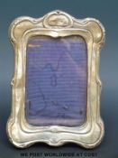 An Edward VII Art Nouveau hallmarked silver photograph frame to suit 6 x 4
