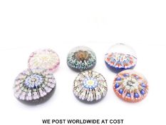 Six Vasart, Strathearn and Perthshire glass paperweights all with various coloured cones,
