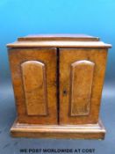 A Victorian walnut table top three drawer collector's cabinet,