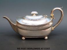 An Irish Georgian hallmarked silver bachelor's teapot, length 24cm, Dublin 1808,