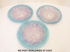 Three Monart shallow glass dishes with blue and white swirling decoration, shape YE,